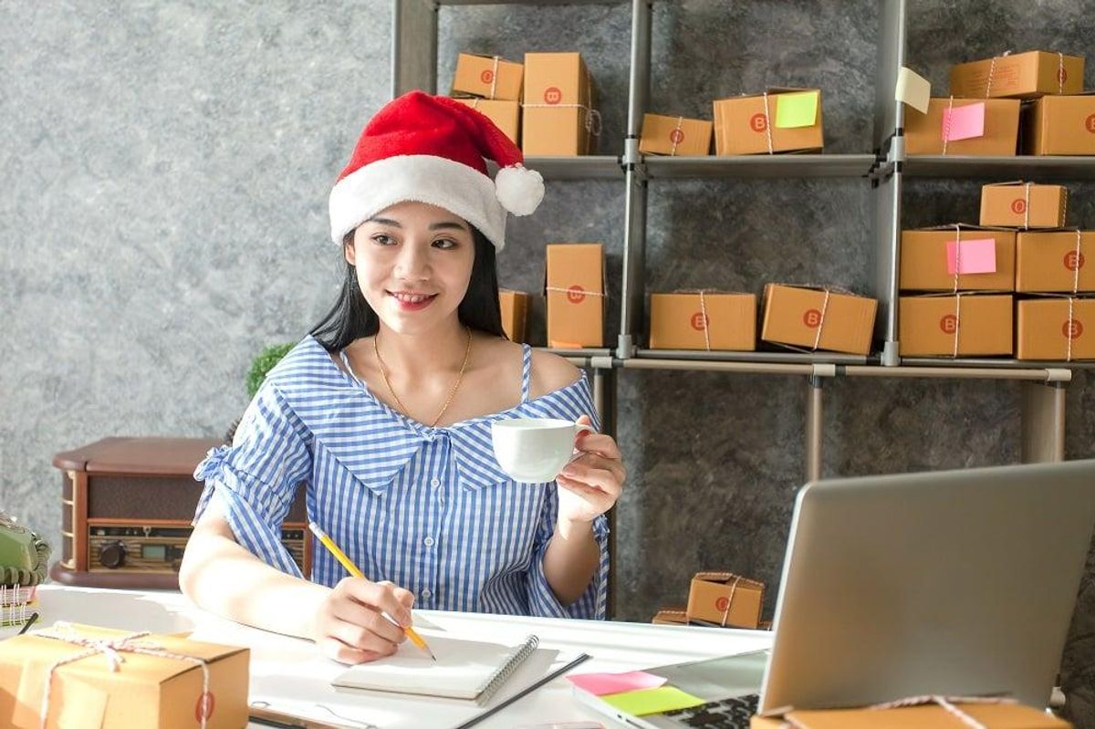 Business Owners wearing Santa hat