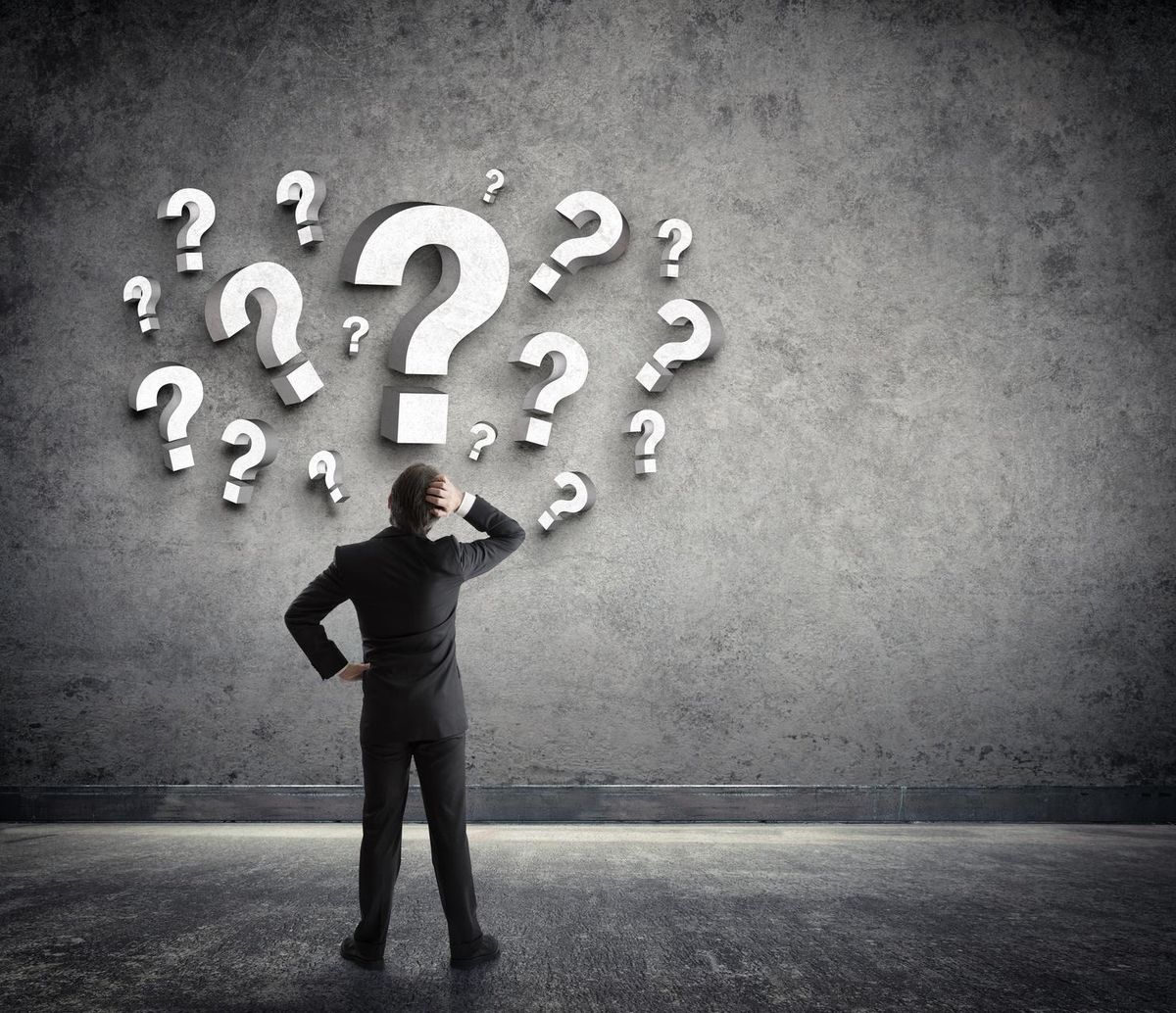 Businessman considering all the factors before selling a business