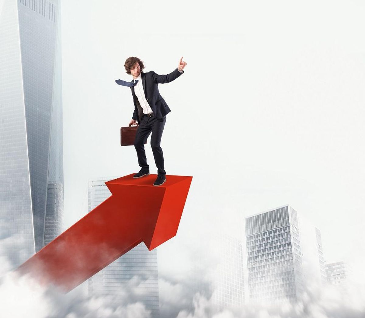 Businessman rides a statistic arrow