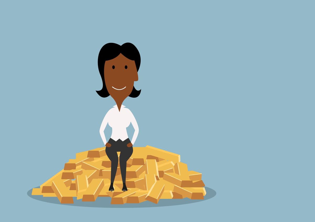Businesswoman sitting on heap of gold bars