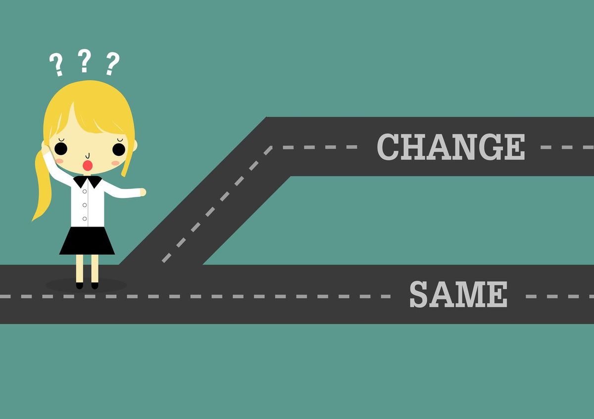 businesswoman stand on road which separate 2 way of change or same.