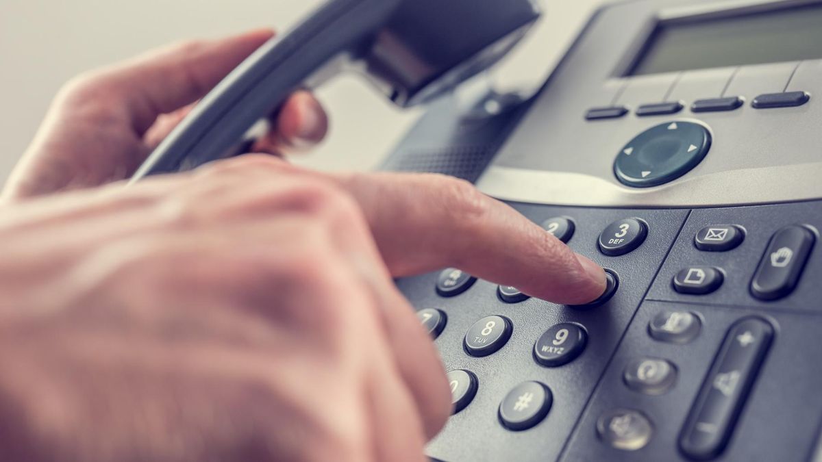 dialling out on a landline telephone for phone prospecting