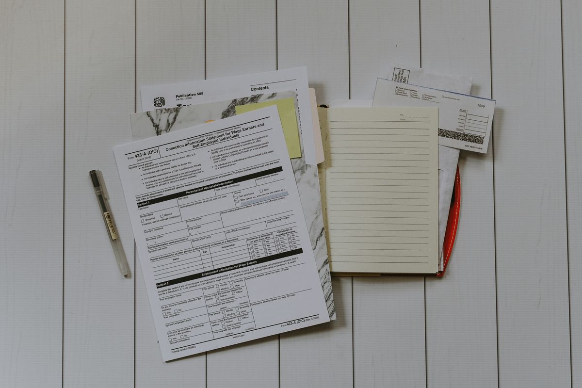 Financial and tax documents in a folder