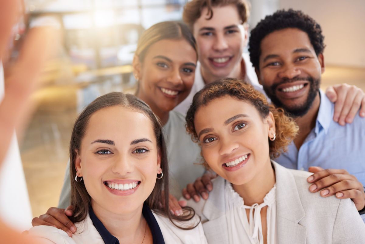 Group selfie of gen z employees