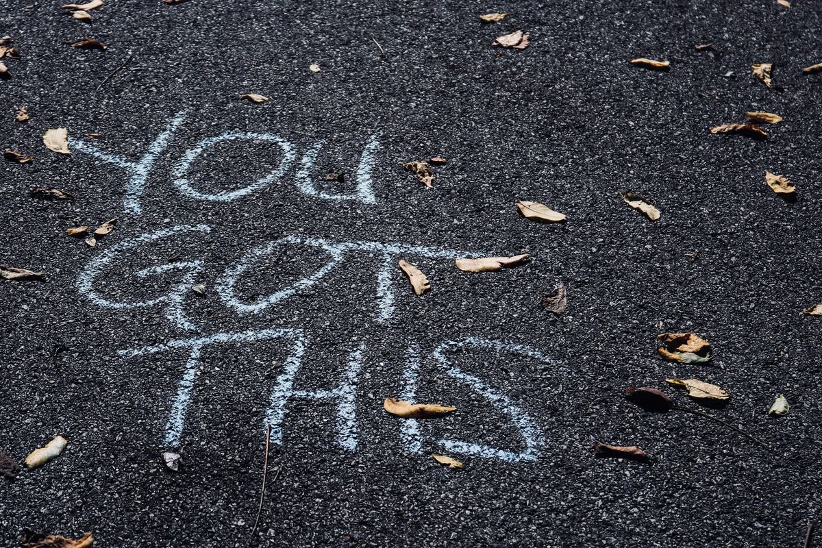 Image of "you got this" slogan on pavement
