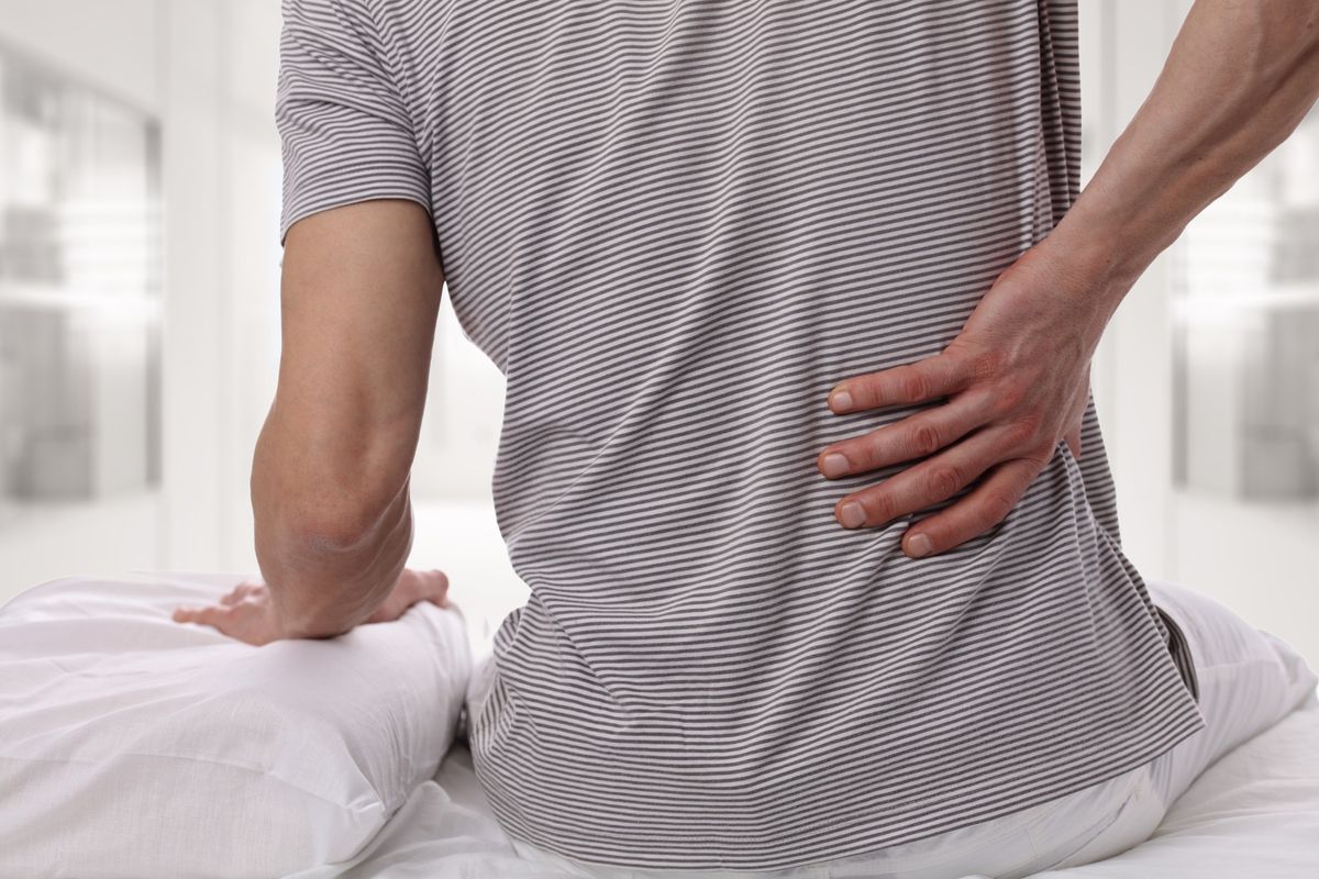 Man suffering from back pain