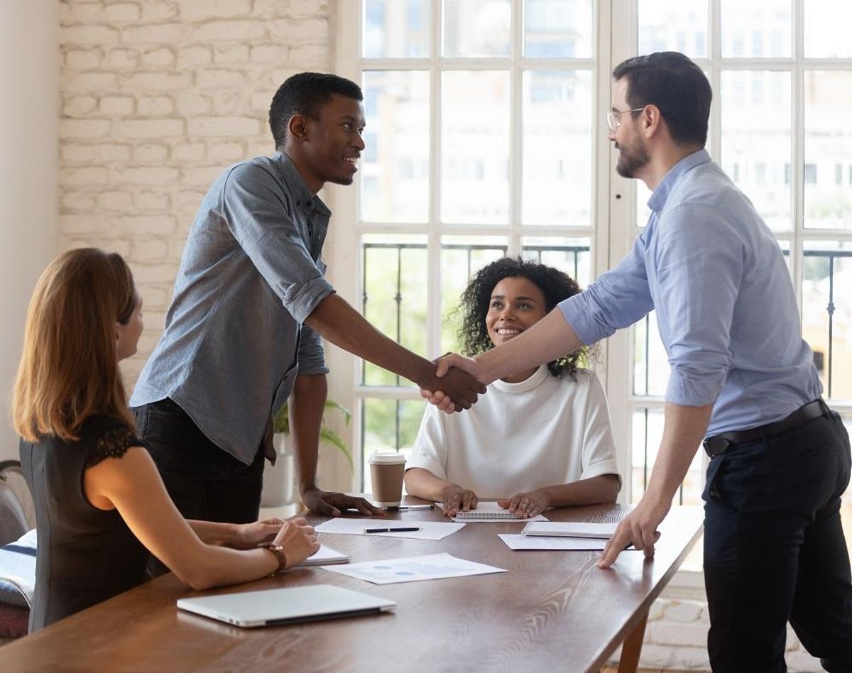 Shaking hands after successful negotiation