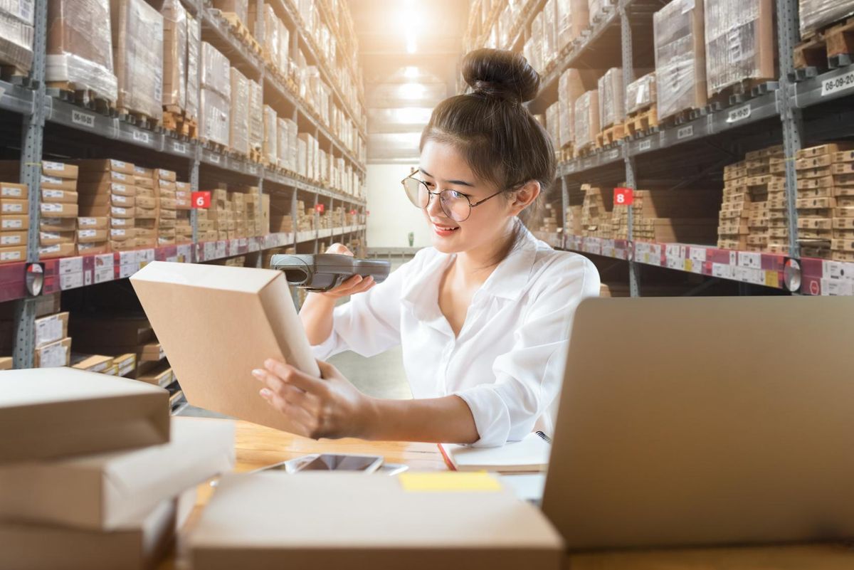 Woman doing a retail inventory at her business